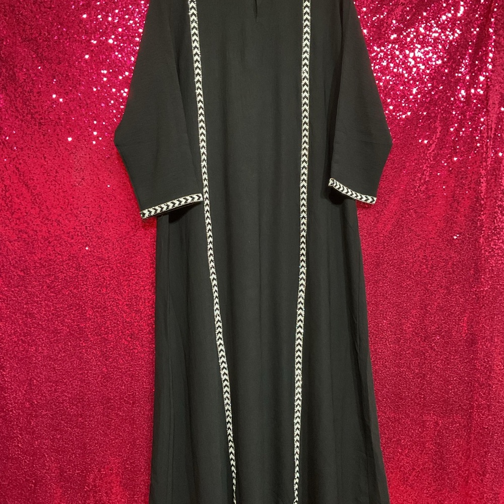 Elegant Black Dress with White Trim